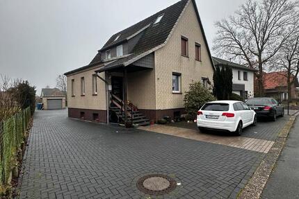 Mehrfamilienhaus(drei bereits vermietete Wohnungen)+baugrundstück