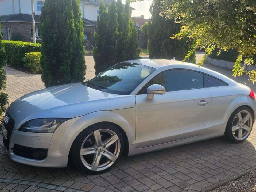 TT