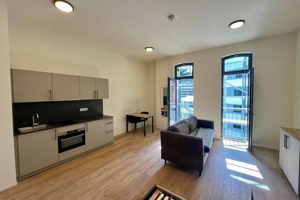 Sie suchen das Besondere? Möblierte 1-Zimmer-Wohnung mit Balkon zum Erstbezug!