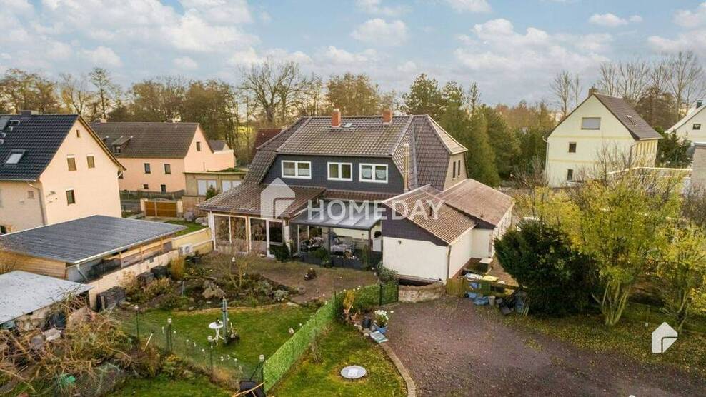 Idyllisches EFH mit EinliegerWohnung, großem Grundstück, Terrasse und 4 Garagen in Milzau