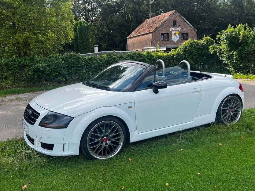 TT