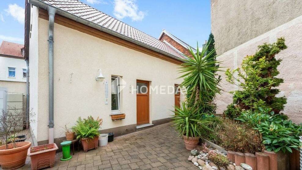 Gepflegte DHH mit Garage, Innenhof, Balkon und Ausbaupotenzial in ruhiger Lage