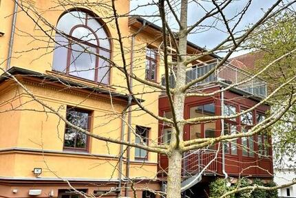 Stilvolle Maisonette-Wohnung mit Garten im Villenviertel