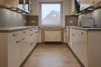 2-Zimmer-Wohnung mit Dachterrasse und Kfz-Stellplatz