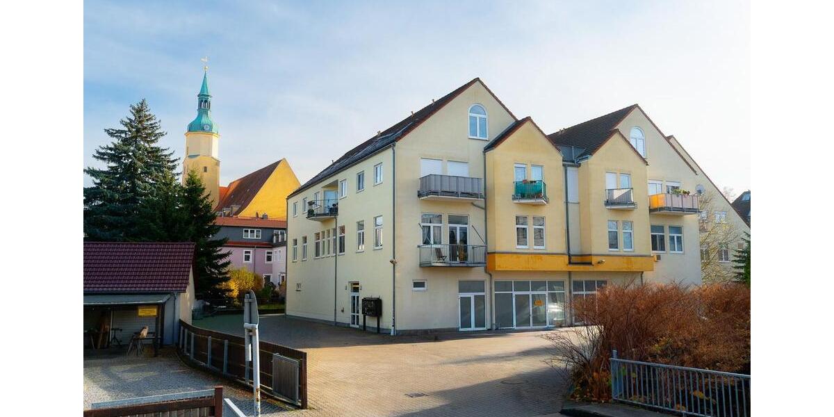 Moderne Dachgeschosswohnung mit sonnigem Westbalkon in zentraler Lage von Pulsnitz 4 zimmer
