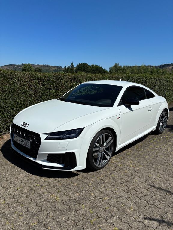 TT