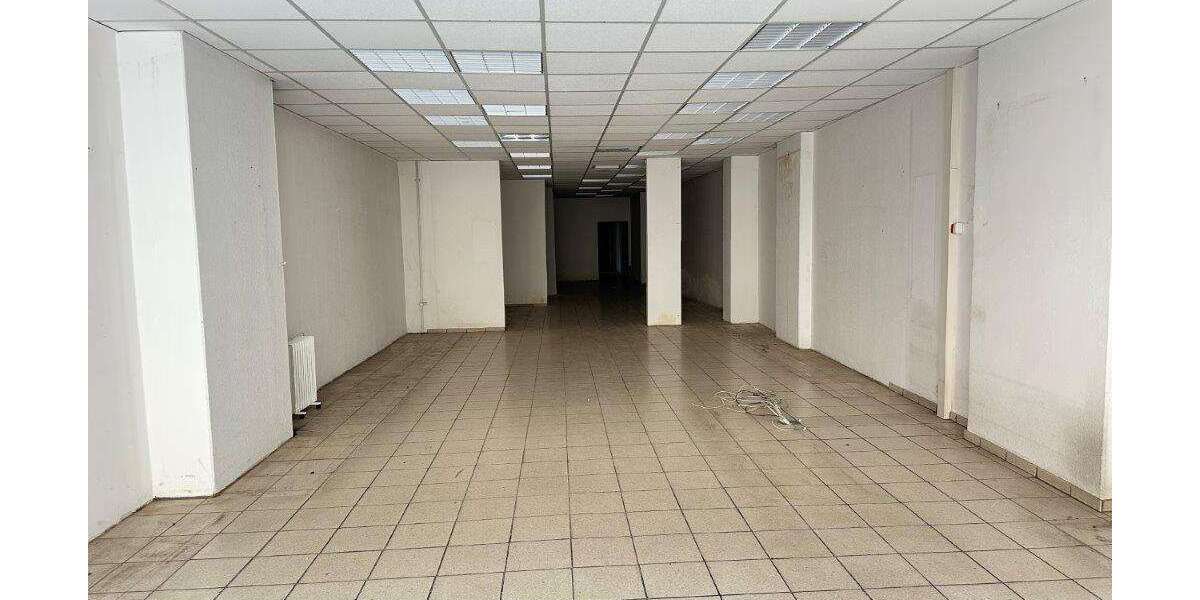 Kapitalanlage : Wohn- und Geschäftshaus mit 3 Wohneinheiten und 1 Gewerbeeinheit in 