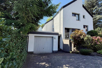 FröndenbergRuhr: Split-Level-Einfamilienhaus in bevorzugter Wohnlage - Ein echtes Liebhaberstück!