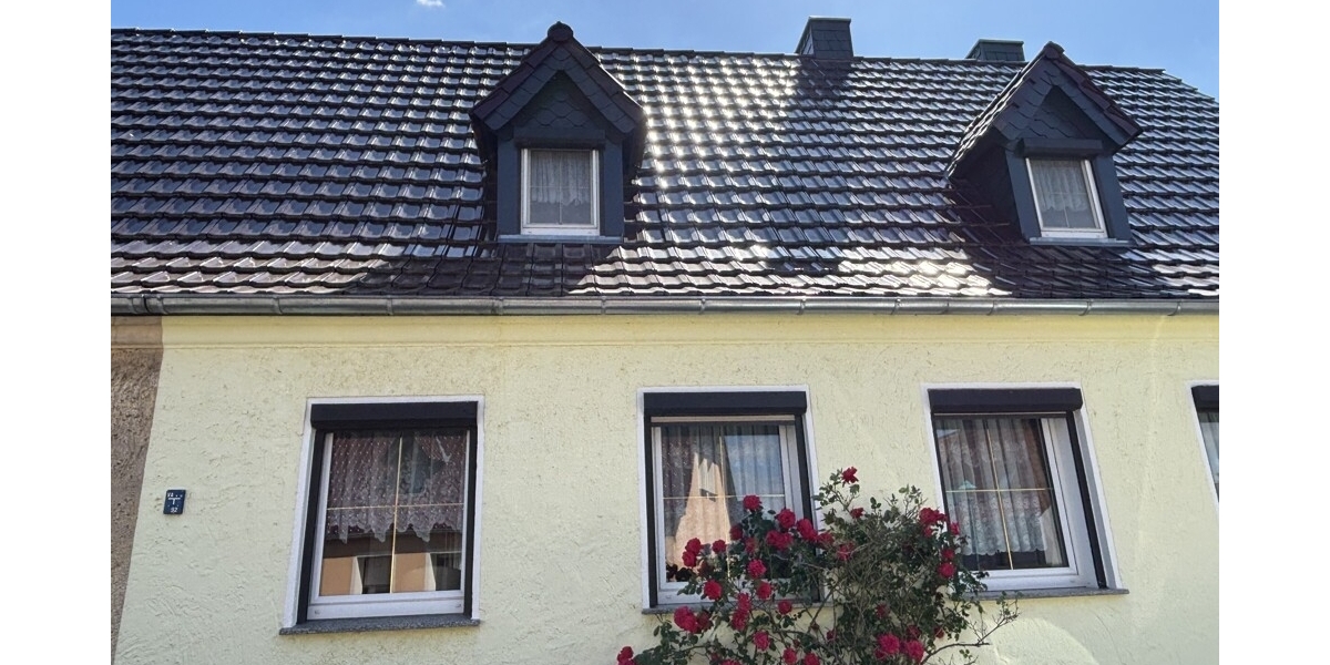 Gemütliche Doppelhaushälfte mit großem Grundstück und Doppelgarage in ruhiger Siedlungslage - Doppelhaushälfte Röderaue | Angebot:27134387