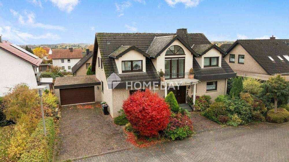 Familienfreundliches Einfamilienhaus mit großem Garten, Kamin und Doppelgarage 7 zimmer