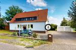 Moderne 2 Zimmer Wohnung mit Traumgarten & Garage in ruhiger Lage