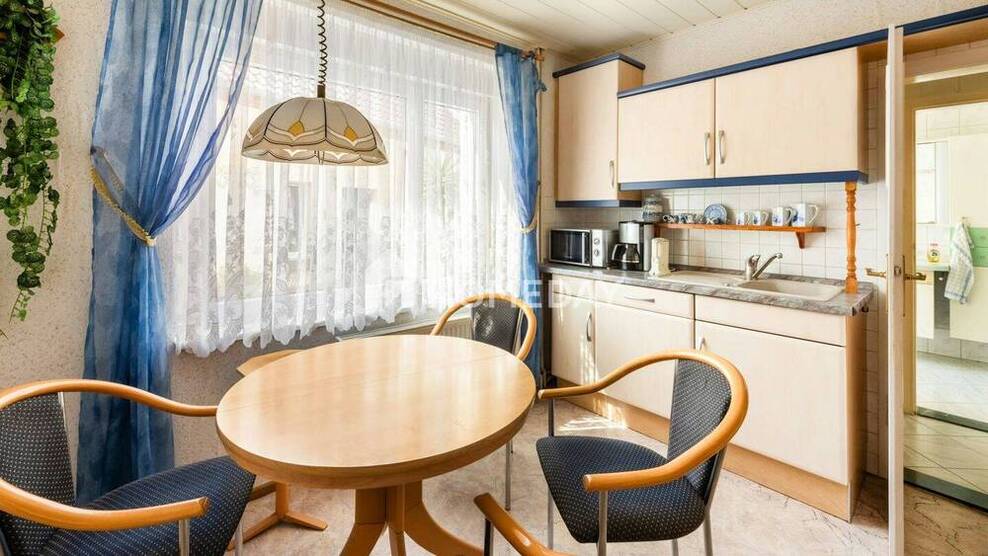 Gepflegte DHH mit Garage, Innenhof, Balkon und Ausbaupotenzial in ruhiger Lage