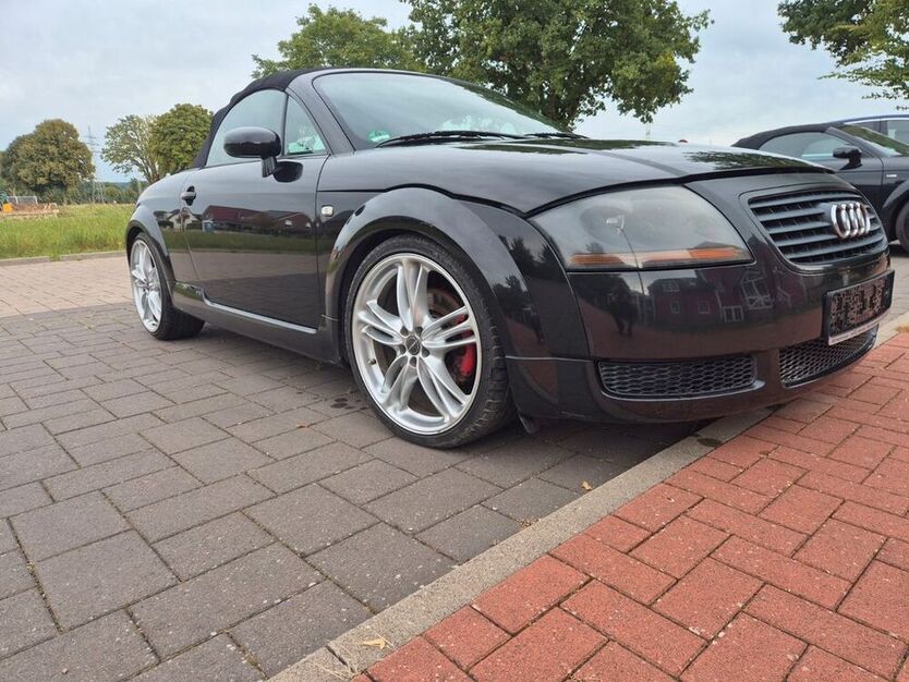 TT