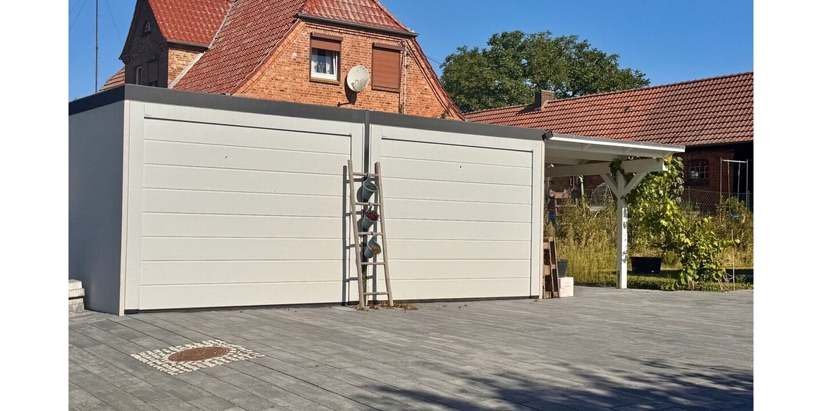 HORN IMMOBILIEN ++ Winkelbungalow 5 km bis Neubrandenburg, Baujahr 2022, Doppelgarage + Carport - Einfamilienhaus Sponholz | Angebot:27069443