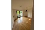 Stilvolle 4-Zimmer Garten-Wohnung mit Einbauküche und Tiefgarage