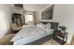 Gepflegte, vermietete 2-Zimmerwohnung mit Garten in Freilassing, Ortsteil Hofham - inkl. TG Platz. - Etagenwohnung Freilassing Freilassing | Angebot:24092327