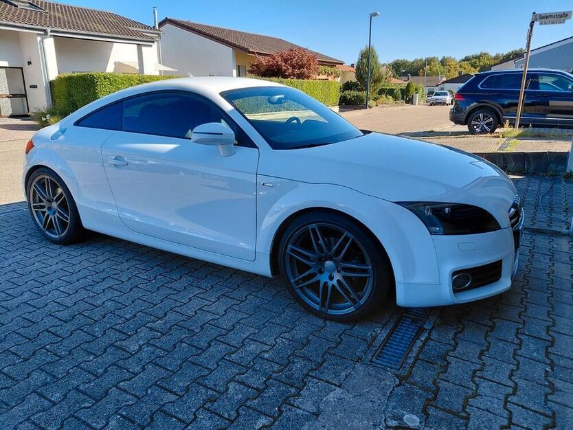 TT