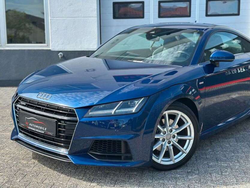 TT