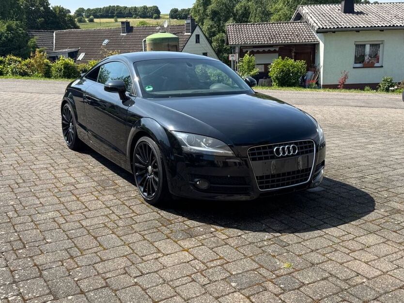 TT