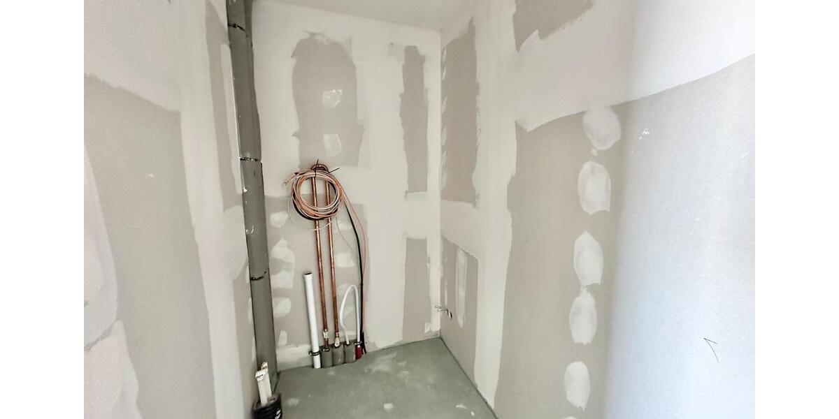 Rastede - Im Göhlen: Neubau-Reihenmittelhaus mit Einbauküche als Erstbezug 5 zimmer