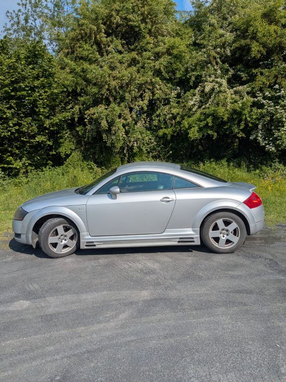 TT