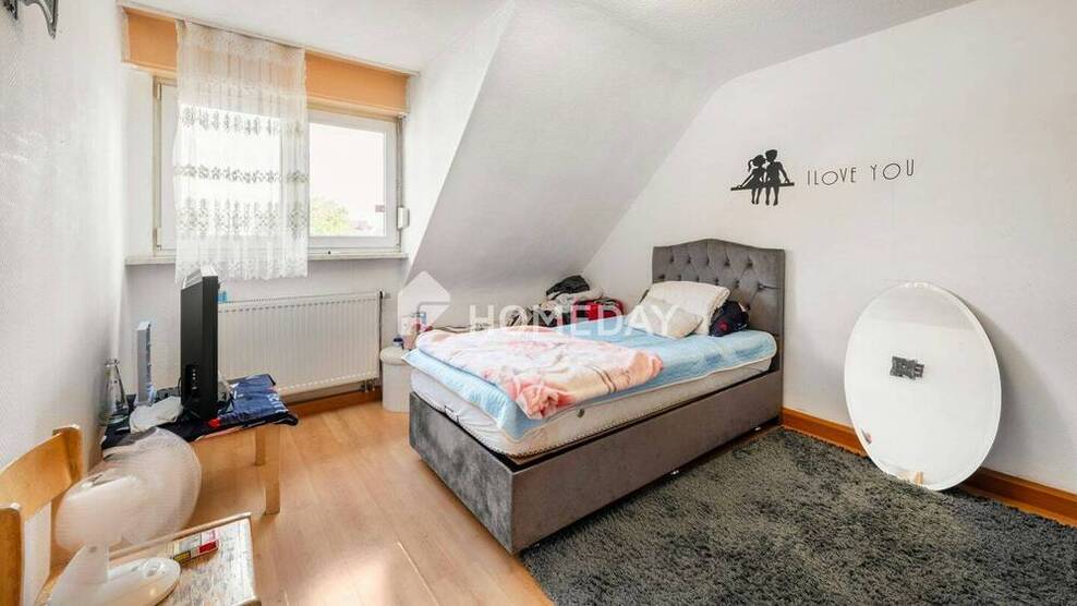 Lichtdurchflutete Dachgeschoßwohnung mit 3 Zimmern in ruhiger Zentrumslage