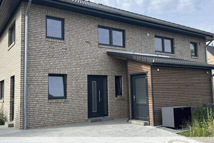 Neubau - komfortable Doppelhaushälfte 4 zimmer