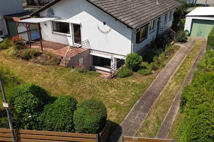 Einfamilienhaus mit großzügigem Garten, Schwimmbad und Garage 5 zimmer