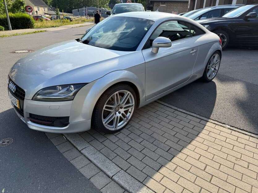 TT
