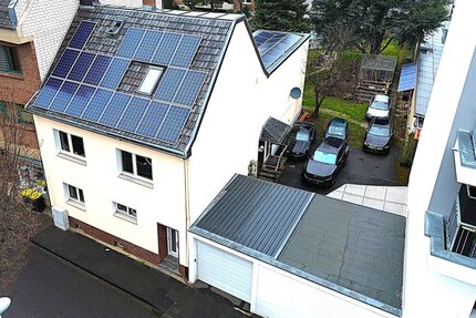 Modernes Einfamilienhaus mit großem Garten - perfekt für die ganze Familie!