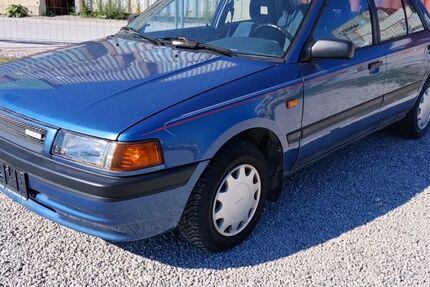Mazda 323 65.000 km 690 &euro; München 81827