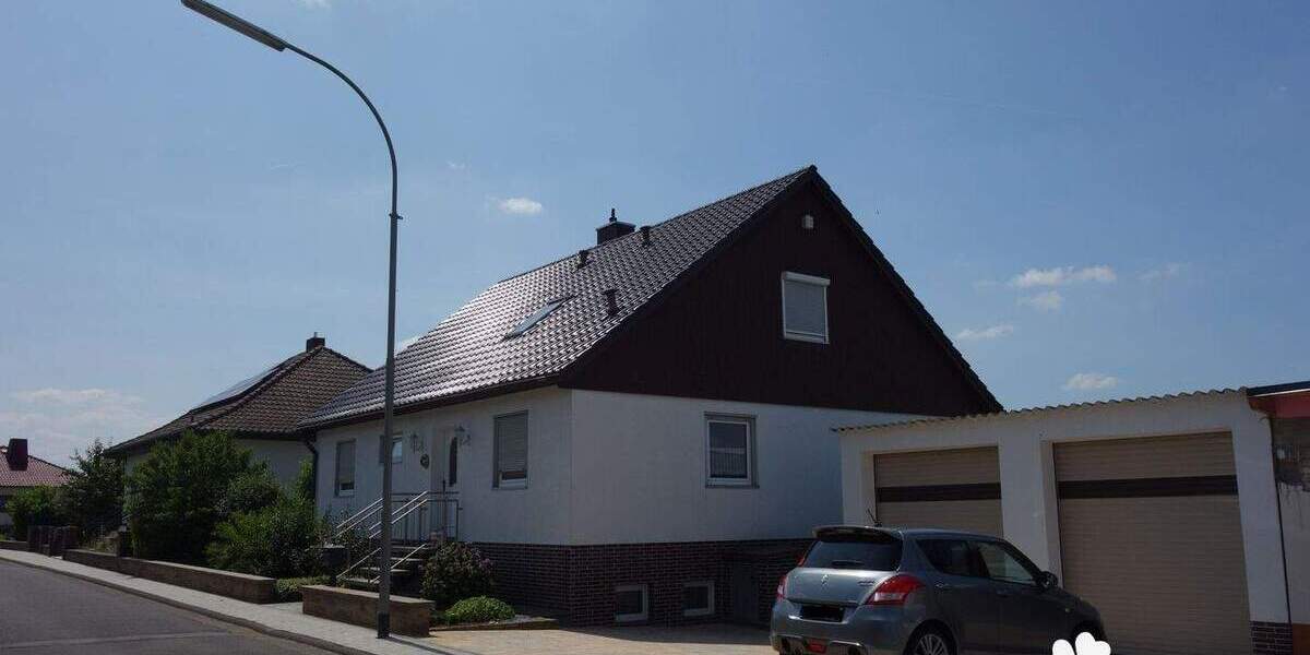 BERK Immobilien - Gepflegtes Einfamilienhaus mit schönem Garten in unverbaubarer Feldrandlage 6 zimmer