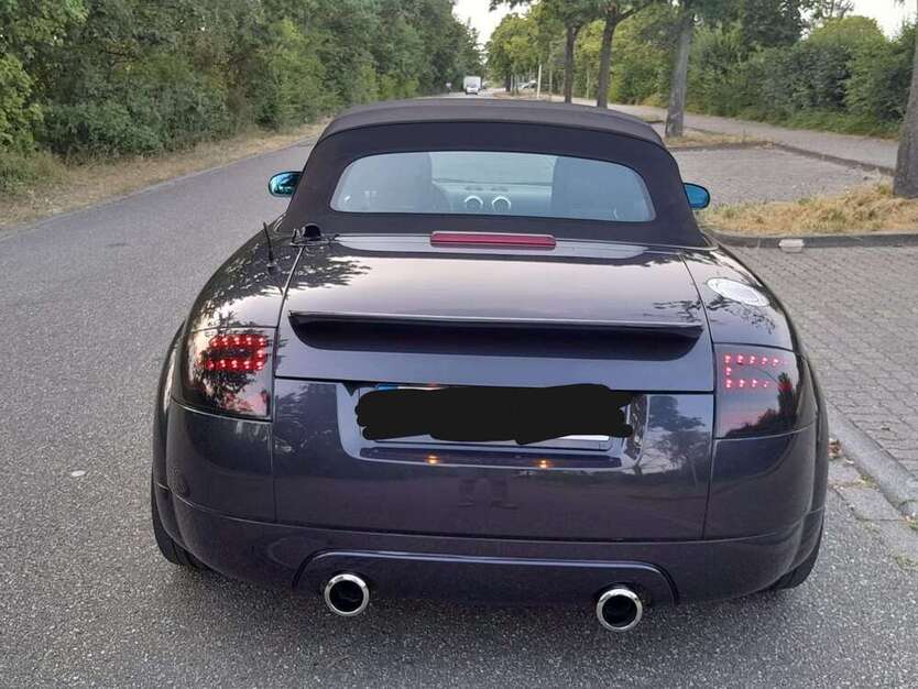 TT