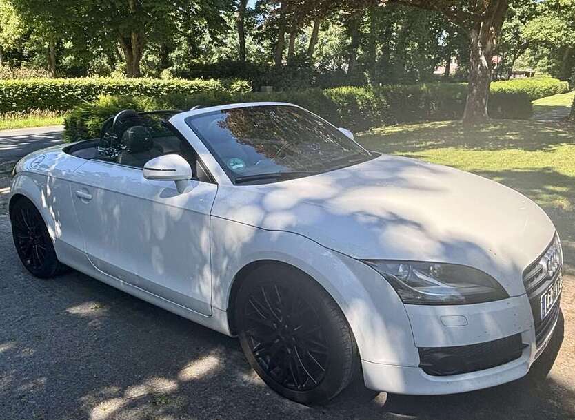 TT