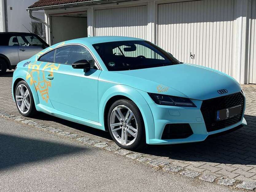 TT