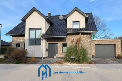 Modernes Einfamilienhaus (2021) mit Garage, überdachter Terrasse und Blick ins Grüne 6 zimmer