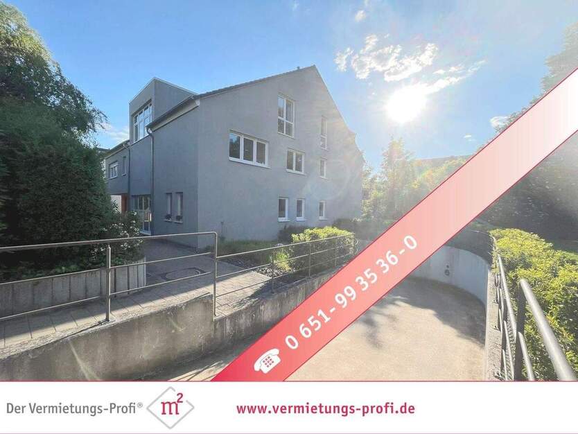 Trier-Feyen-Lichtdurchflutetes Wohngefühl - Exklusive 2-Zimmer-Wohnung mit Eichenparkett, Einbauküche, Balkon & Tiefgarage 2 zimmer